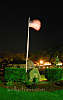 this-is-new-york.com Flag flying over Hobart NY at night photo by Kelly Chien